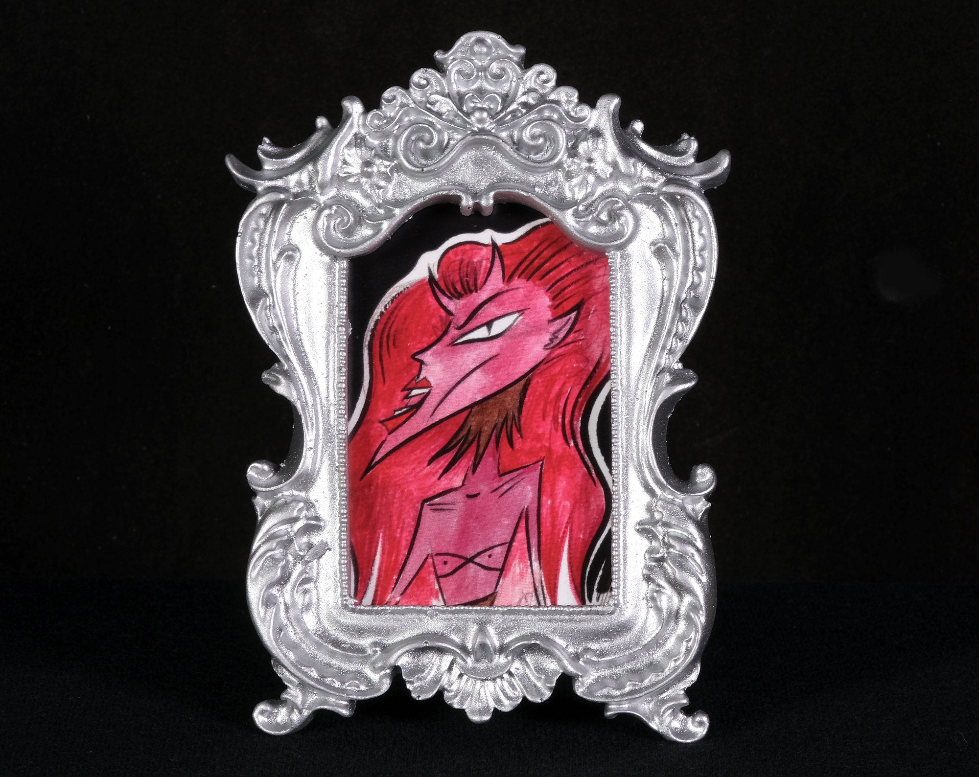 Red Haired Tiny Demon Framed Print