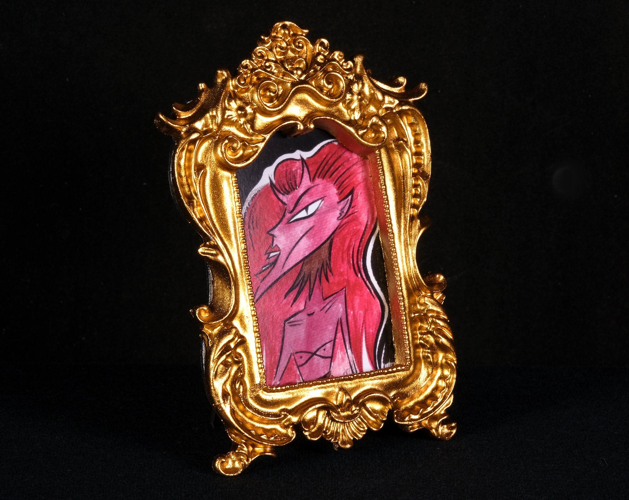 Red Haired Tiny Demon Framed Print