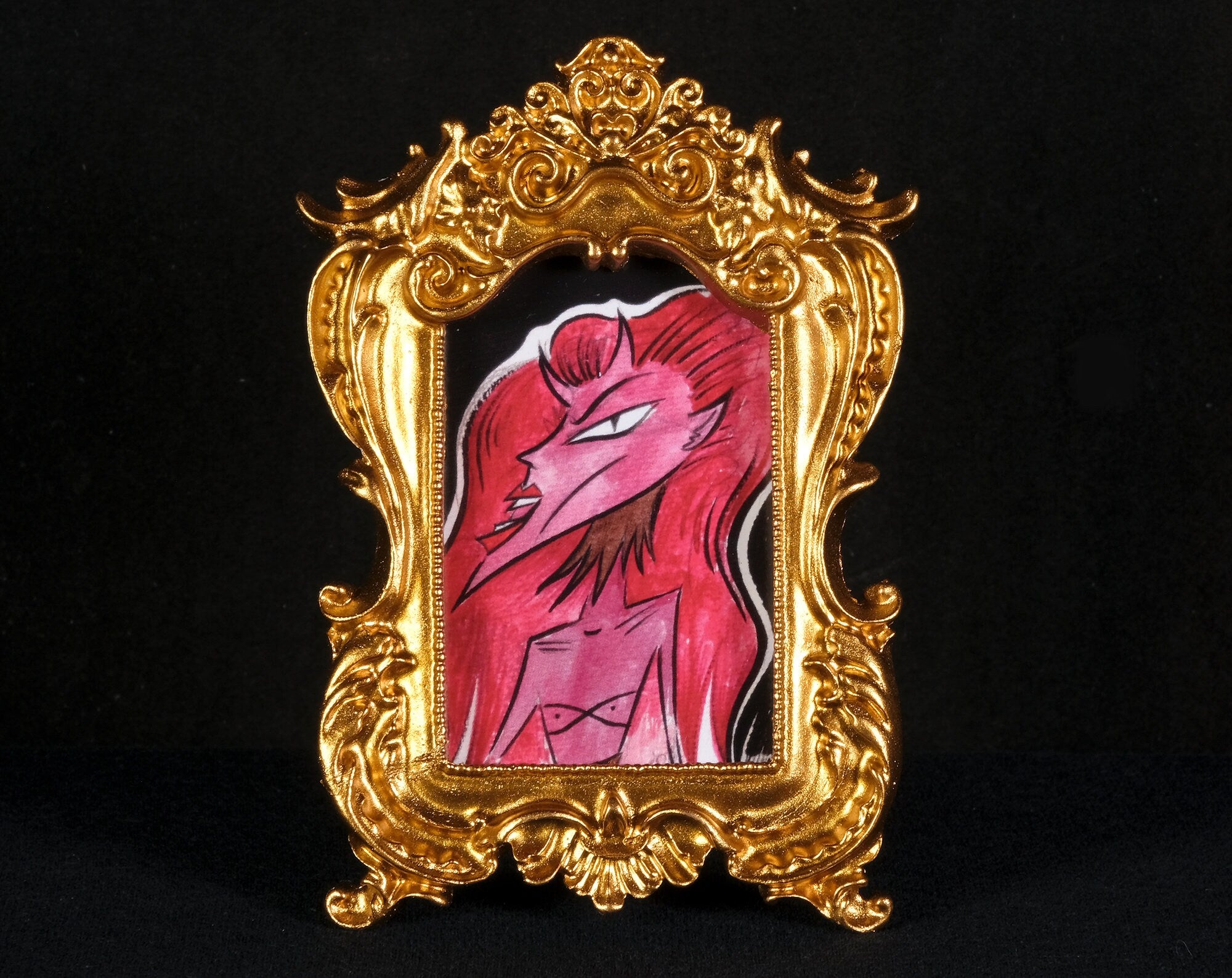Red Haired Tiny Demon Framed Print
