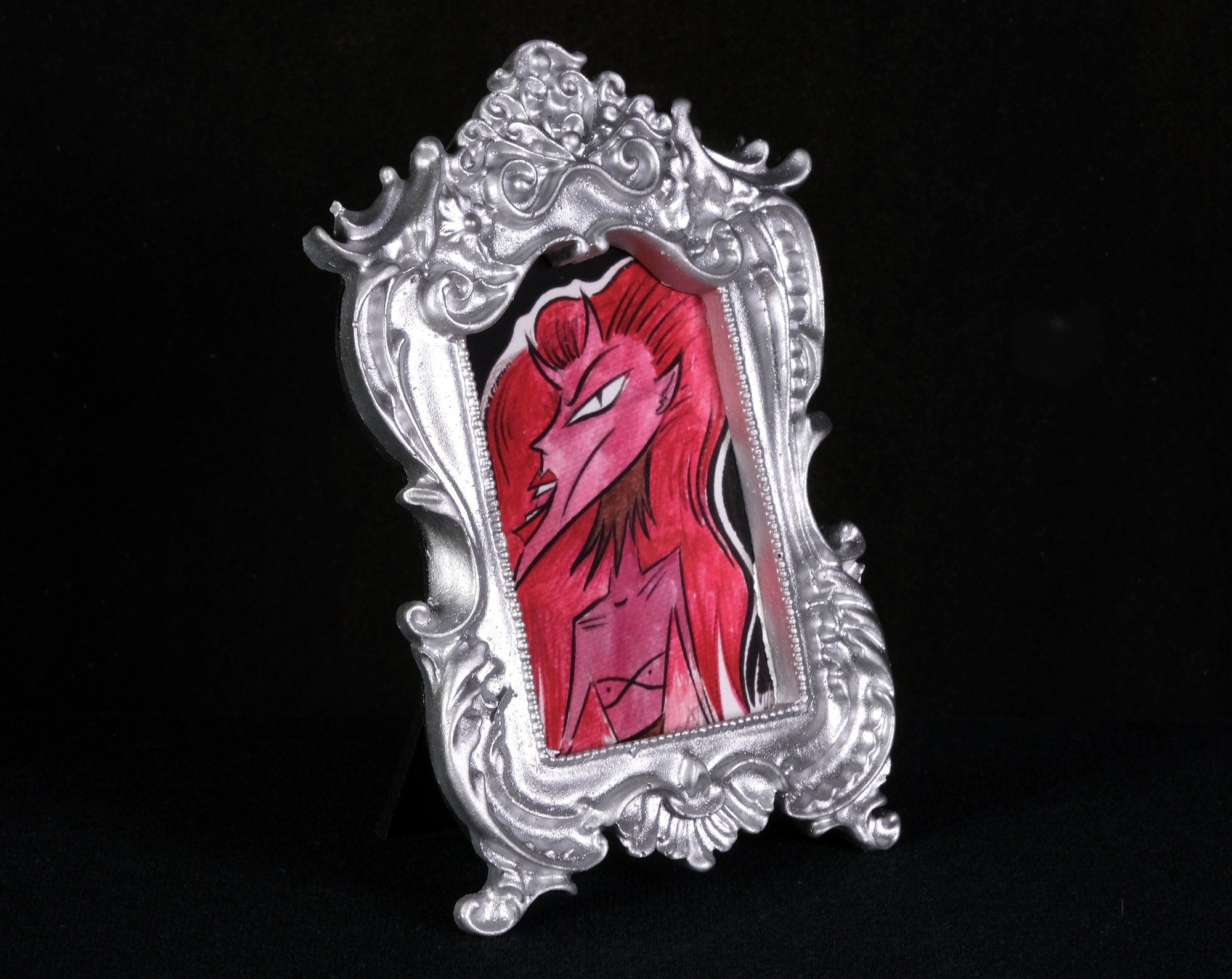 Red Haired Tiny Demon Framed Print