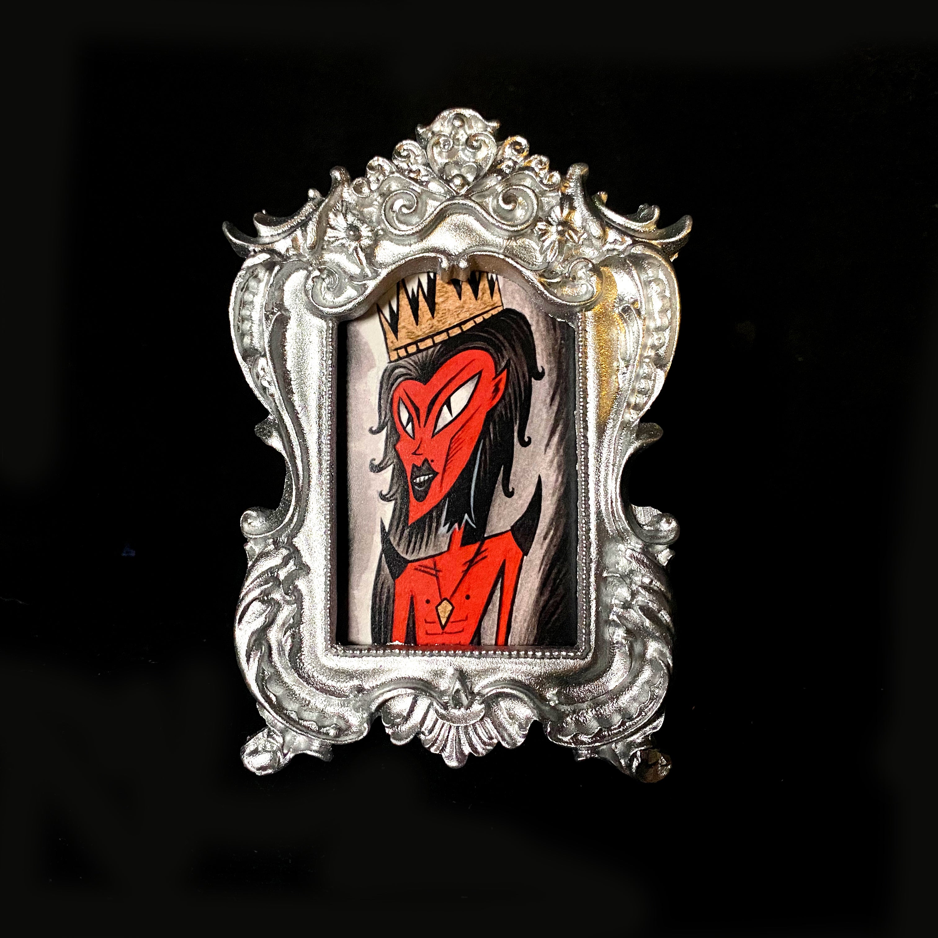 Sinister Tiny Demon Framed Print