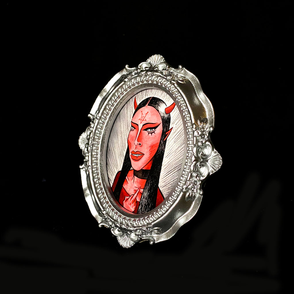 Finger Tiny Demon Framed Print