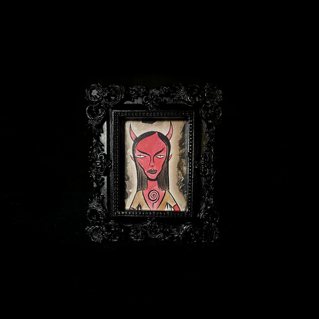 Spiral Tiny Demon Framed Print