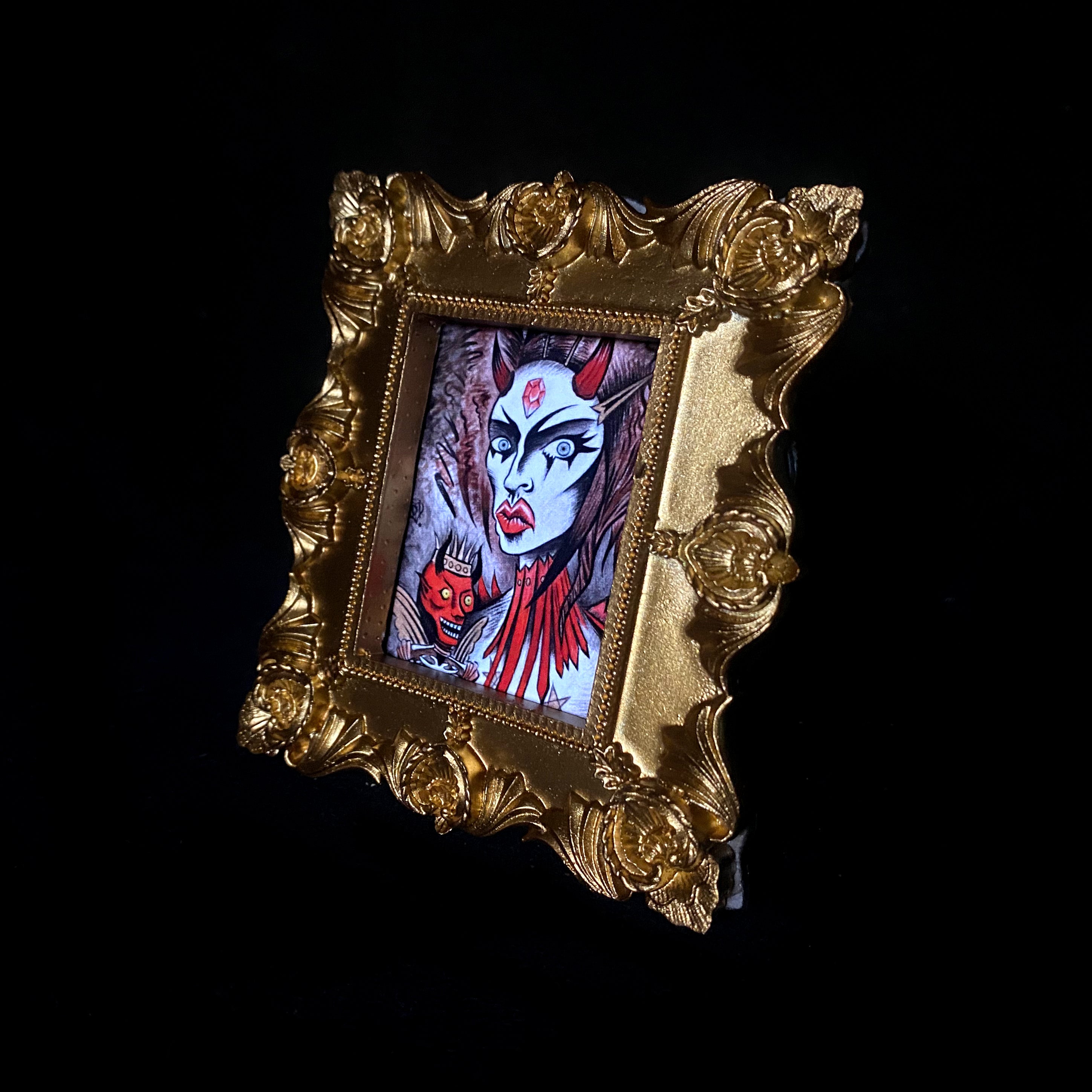 Disasterina Tiny Demon Framed Print